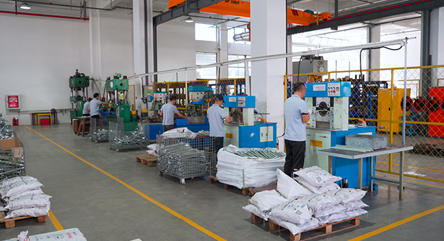 Goto Electric's Operation Workshop And Workers Operating Equipment